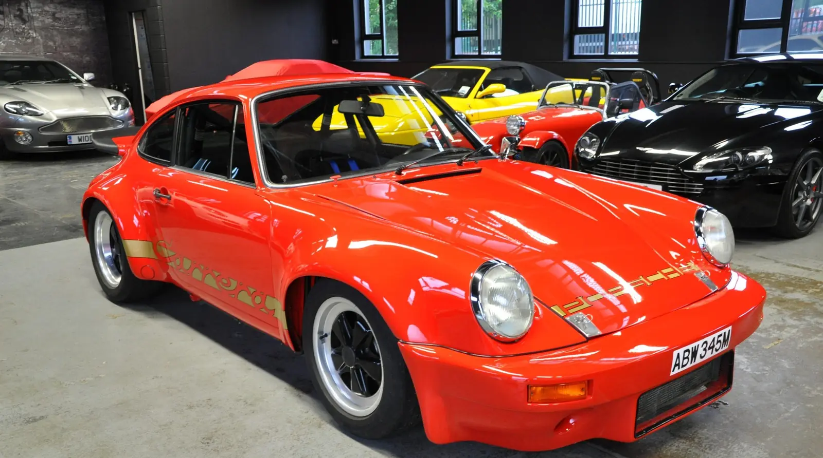 Orange classic Porsche 911 in the studio